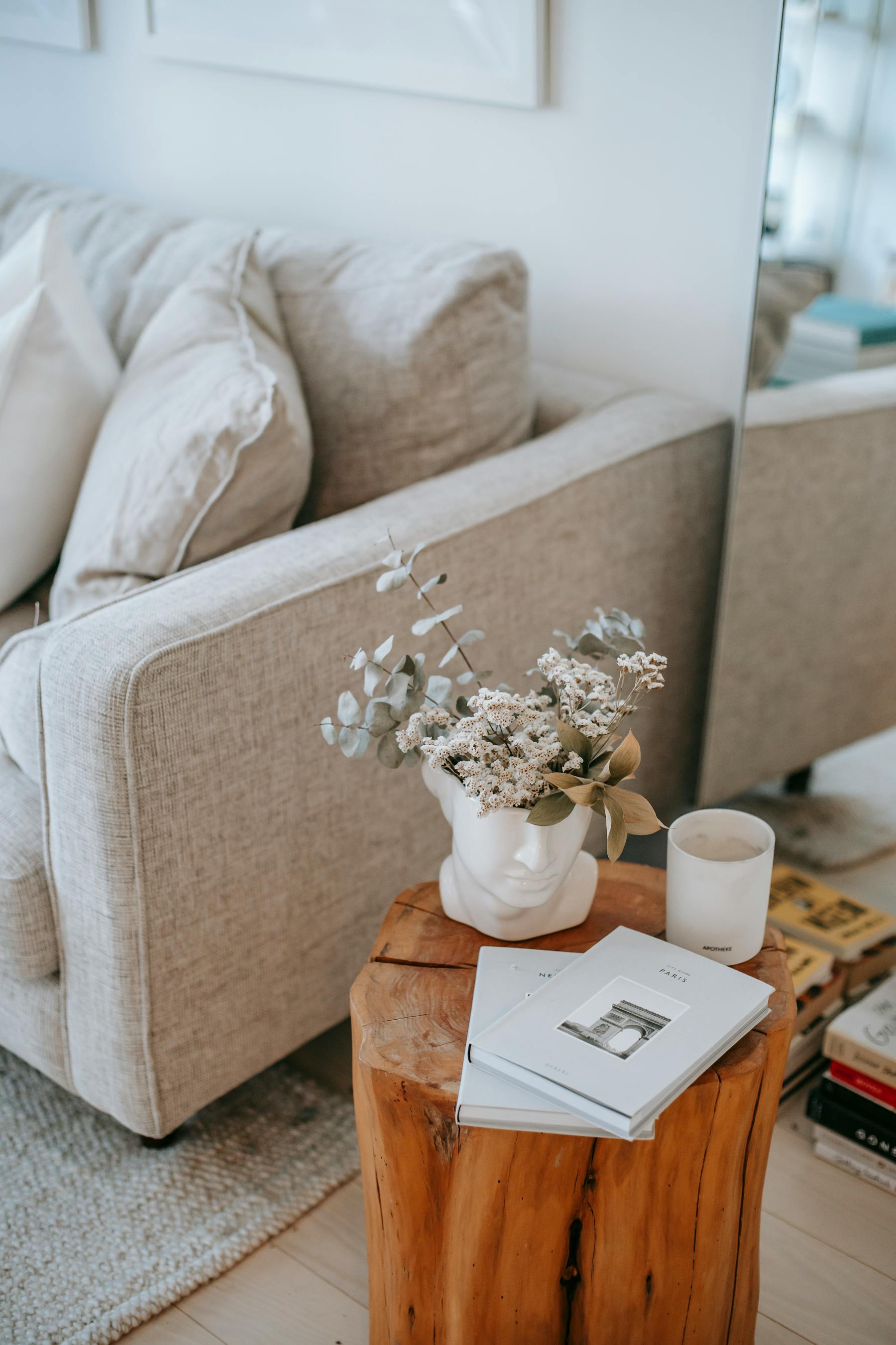 Refined living room with sofa, table and decorative homewares